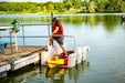 Connect-A-Dock Roto Grab Bar Overhead Assist Model YAK1022 stepping onto the dock using the overhead bar.