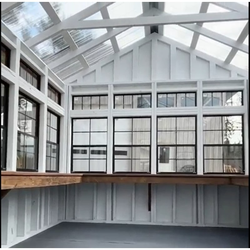 Driftless Outdoors Horizon Greenhouse inside view of windows, shelves and roof